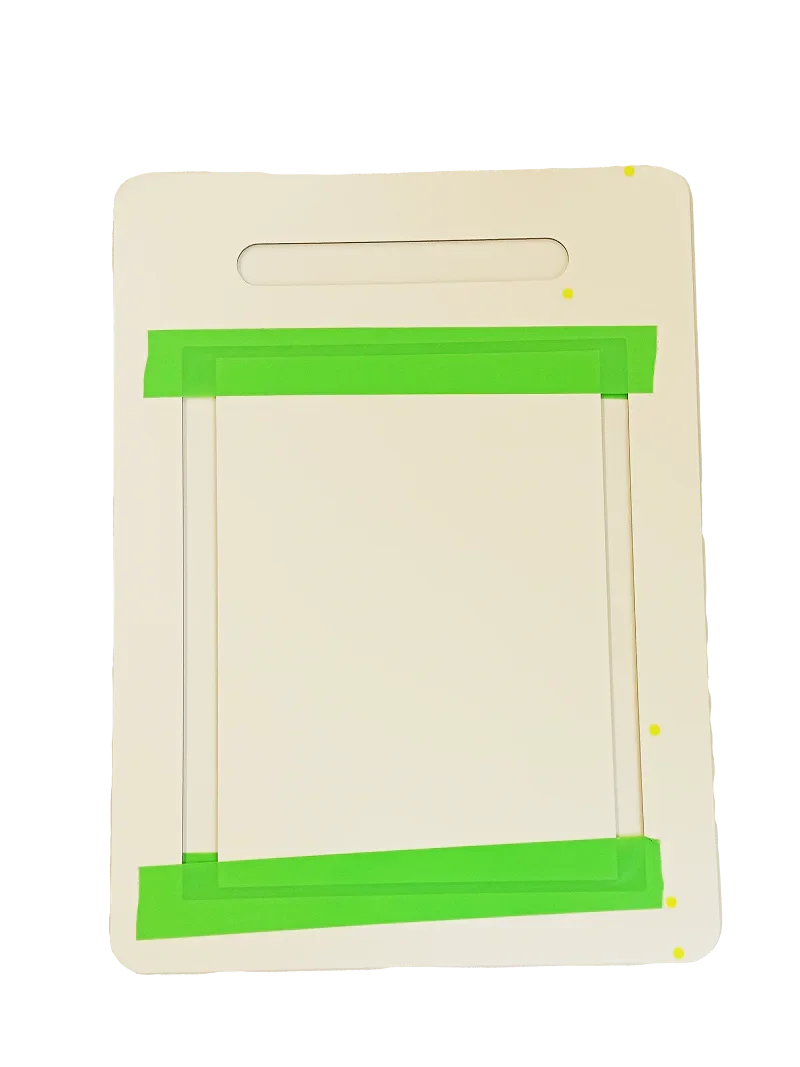 Cream pet door frame with green tape, showing installation guide for air-tight, energy-efficient pet access.