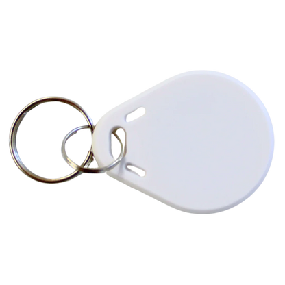 White pet access tag with keyring for secure chip-based entry to pet doors